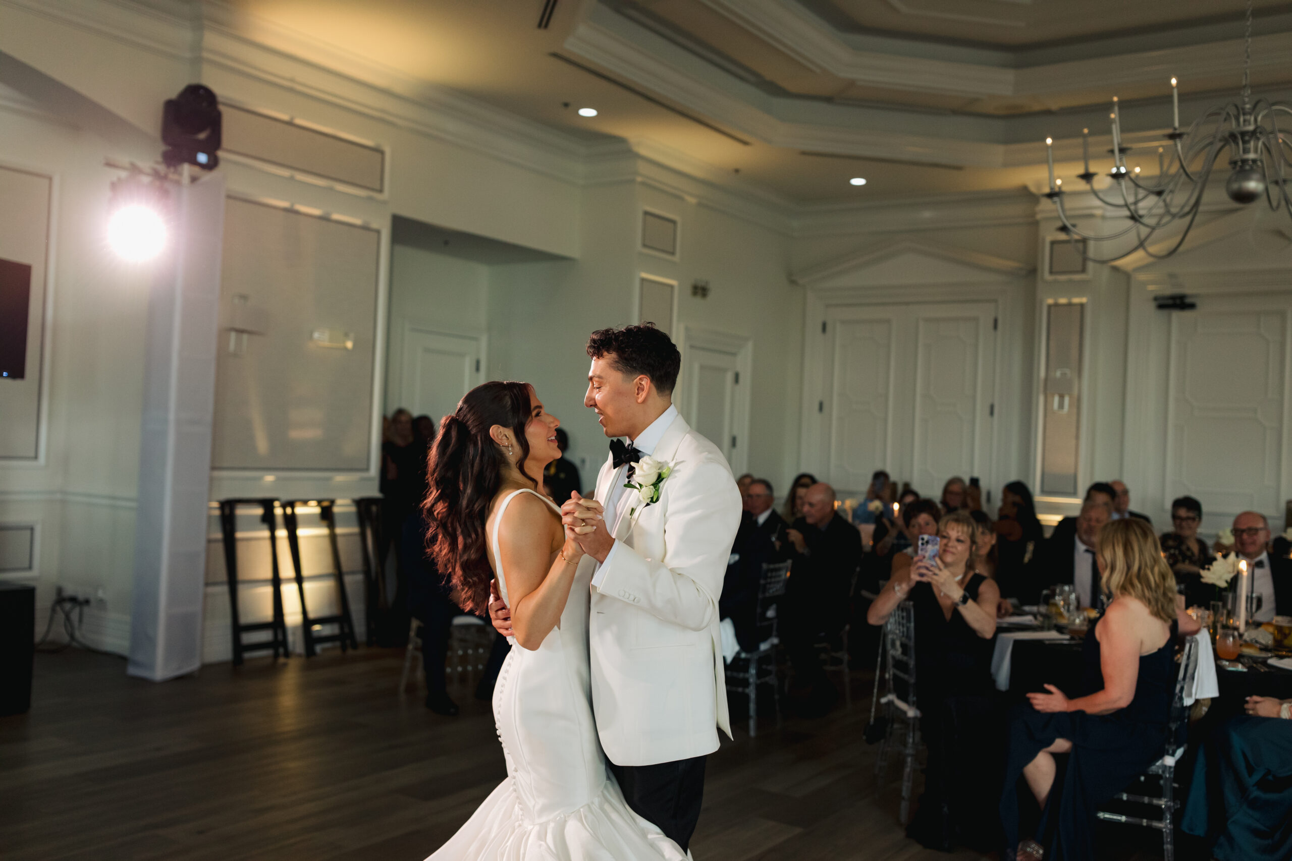 First dance at luxury Naples wedding reception with romantic lighting